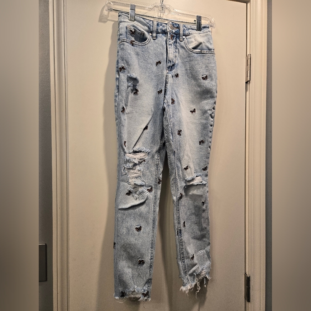 Light Blue Distressed Jeans with Embroidered Details